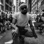 A group of dancers rehearsing for the pride parade