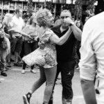 A couple hustle dancing at the 3rd Ave street fair in Bay Ridge.