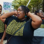 Young people dancing at a climate protest in Washington DC